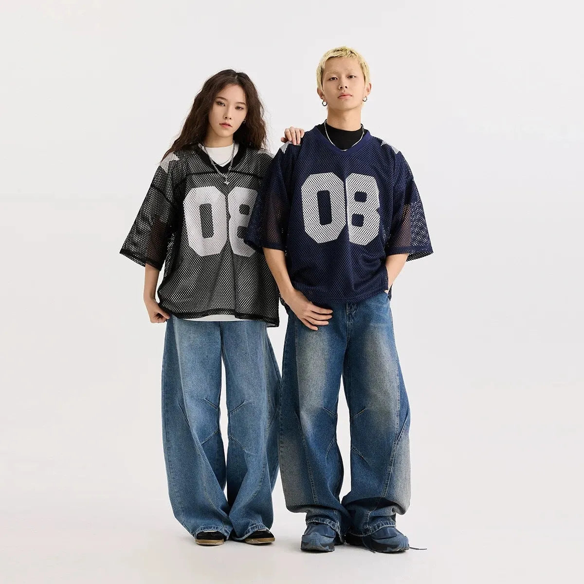 Black polyester pullover shirt with white letter print pattern, loose fit design