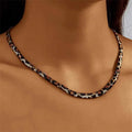 Women's alloy leopard necklace with leopard print motif against a neutral background