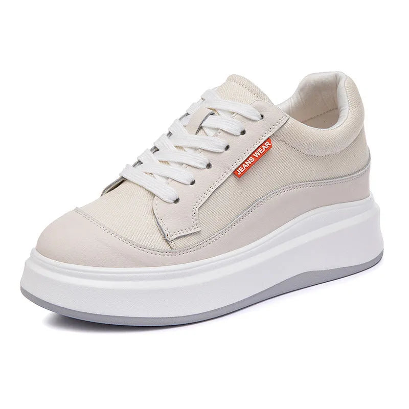 Women's thick-soled leather board shoes in pink and beige colours showing height-increasing design