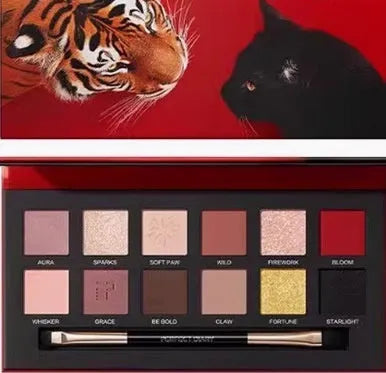 Explorer twelve-colour animal eye shadow palette showing golden tiger, red fox and leopard design shades