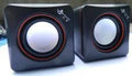 Black square USB-powered 2.0 channel computer speaker for desktop audio enhancement