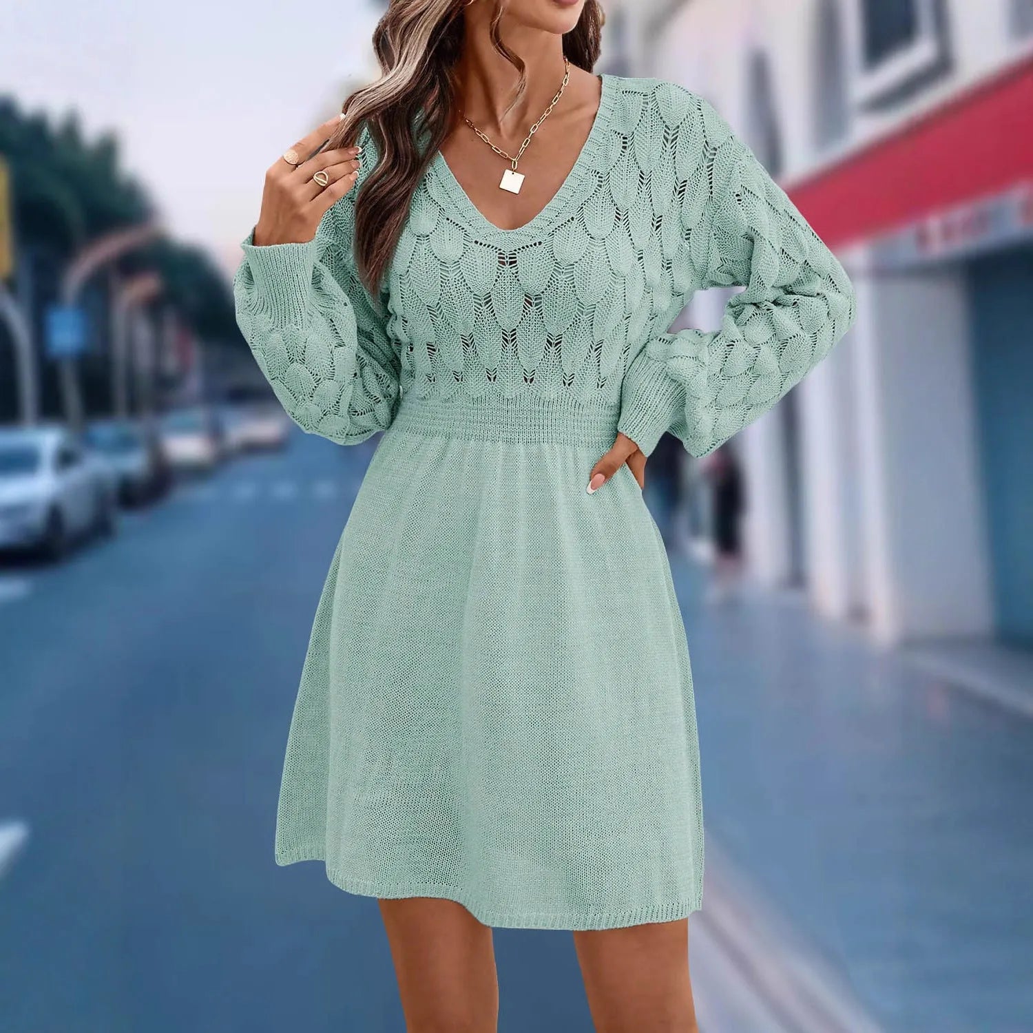 V-neck artistic beach dress with long sleeves and 3D pattern detail in acrylic fabric