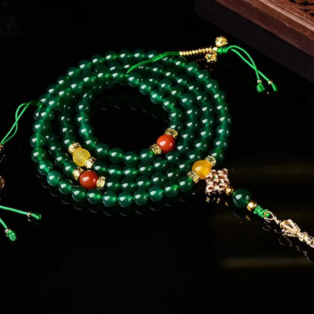 Natural green agate multi-circle bracelet on wrist, showing 8mm bead size.