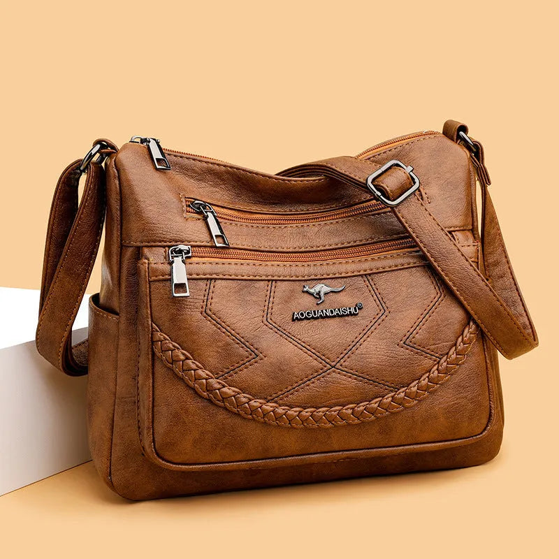 Soft PU leather women's crossbody shoulder bag in horizontal square shape with zippered pockets