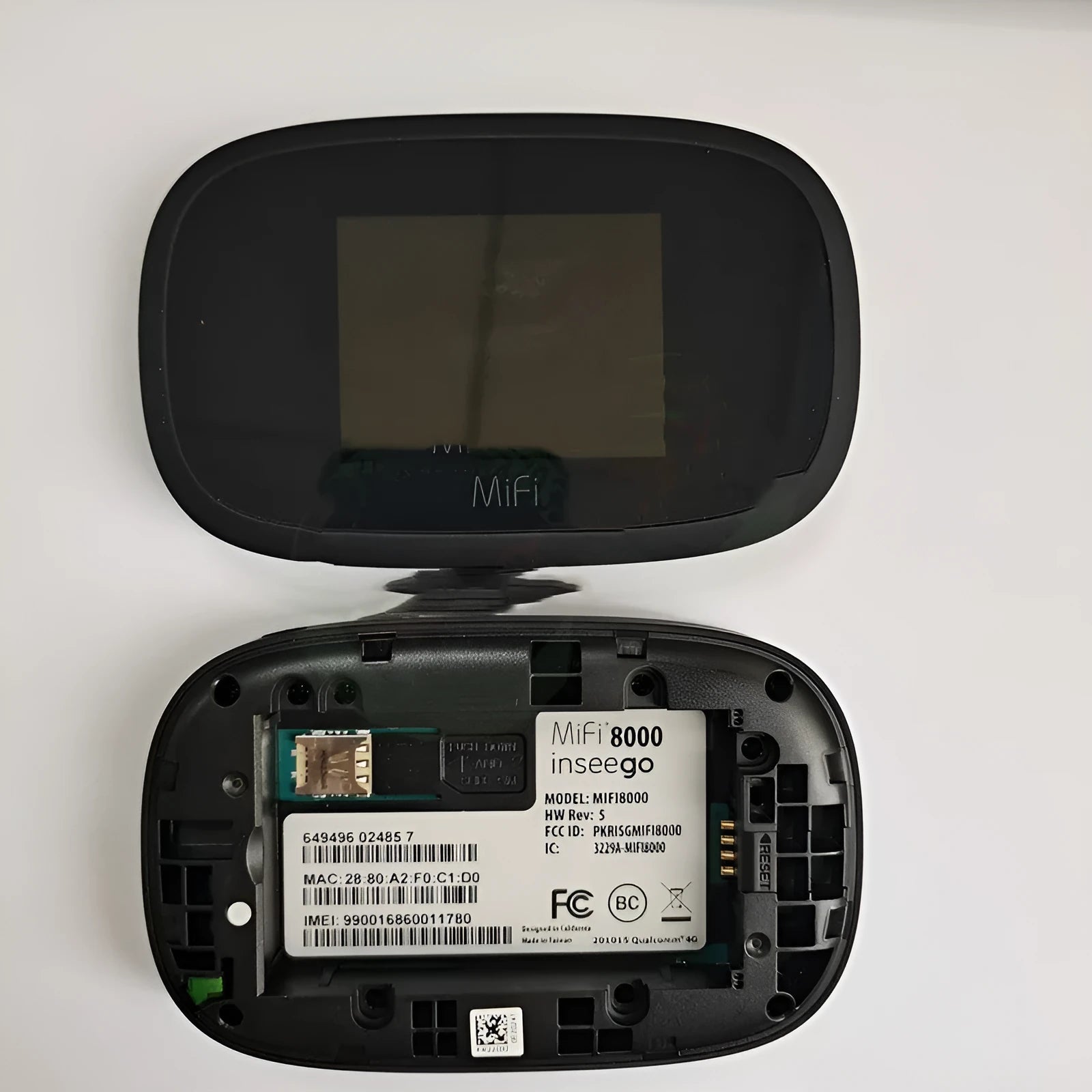 Black portable 4G wireless router with compact design for mobile internet access.