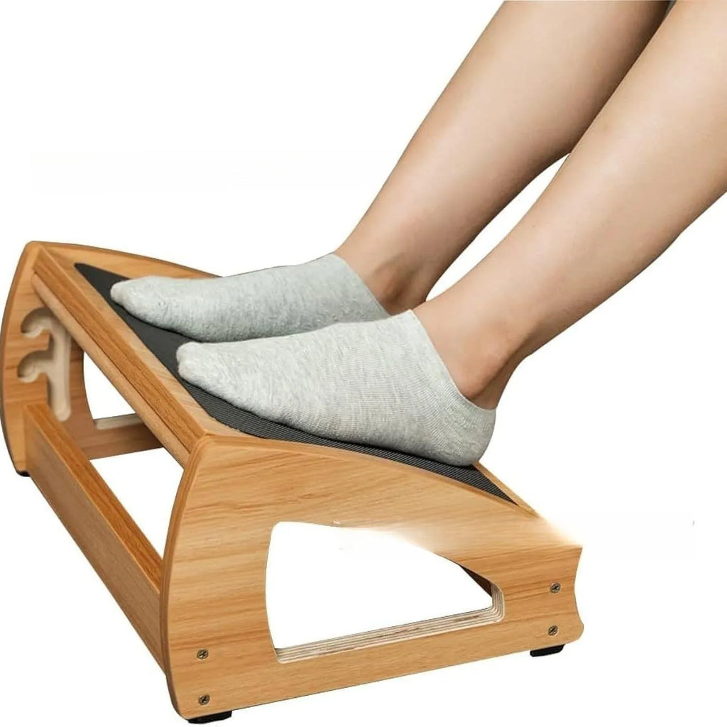 Wooden adjustable bamboo office desk footstool in natural wood colour, shown as an under-desk ergonomic foot rest.