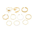 Women's alloy openwork flower ring with glossy electroplated gold finish
