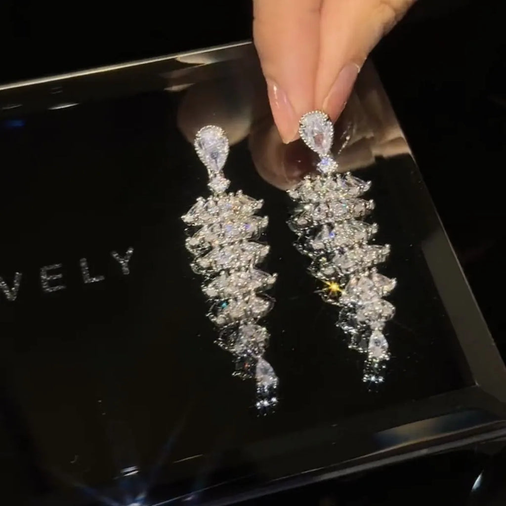 Women's Christmas tree drop earrings with sparkling zircon stones in silver pagoda colour