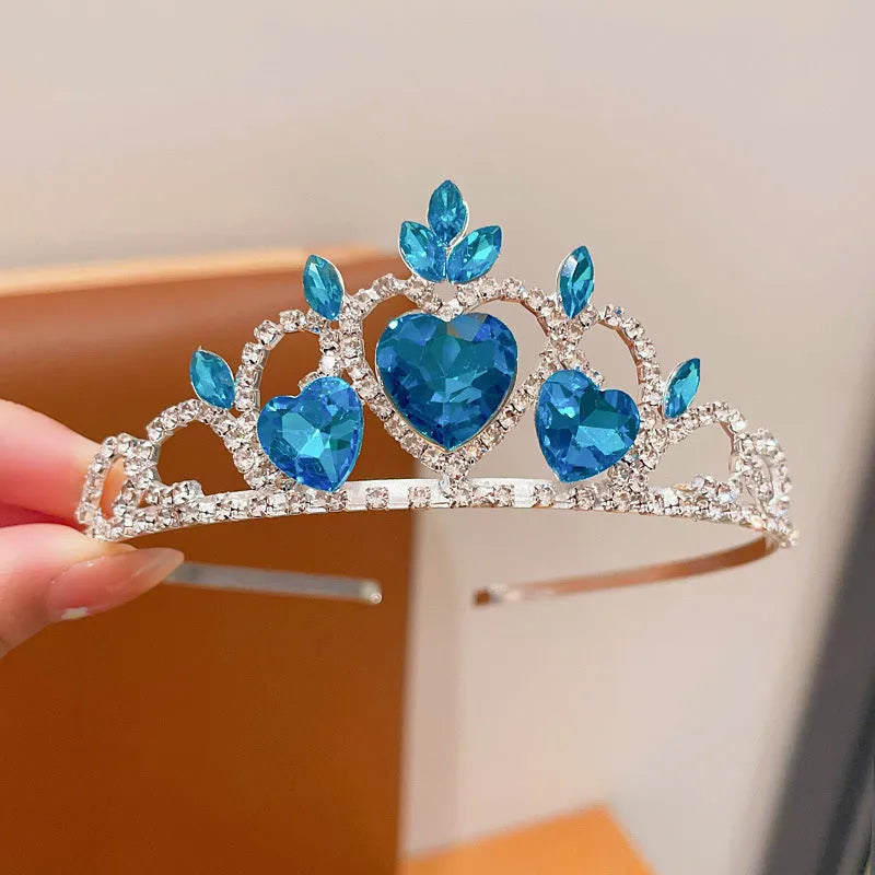 Children's electroplated alloy crown headband headdress in pink, light blue, and light purple crystal colours.