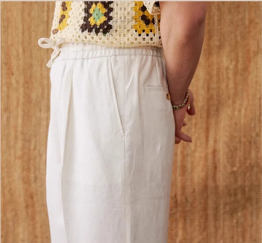 Linen straight-leg casual trousers with an elasticated high waistband in greige colour.