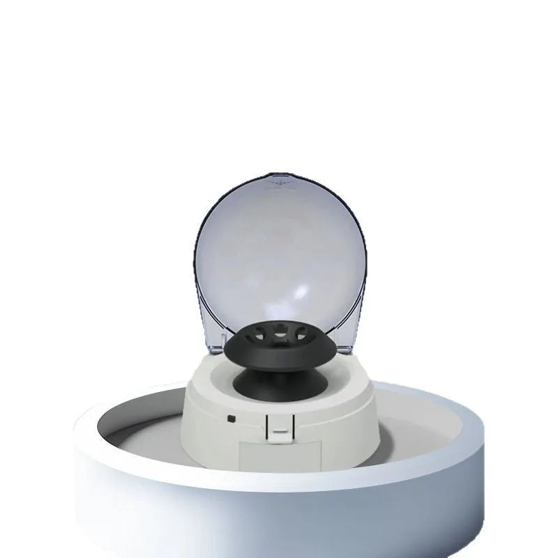 Mini laboratory centrifuge on a benchtop with dimensions 157mm wide by 170mm deep