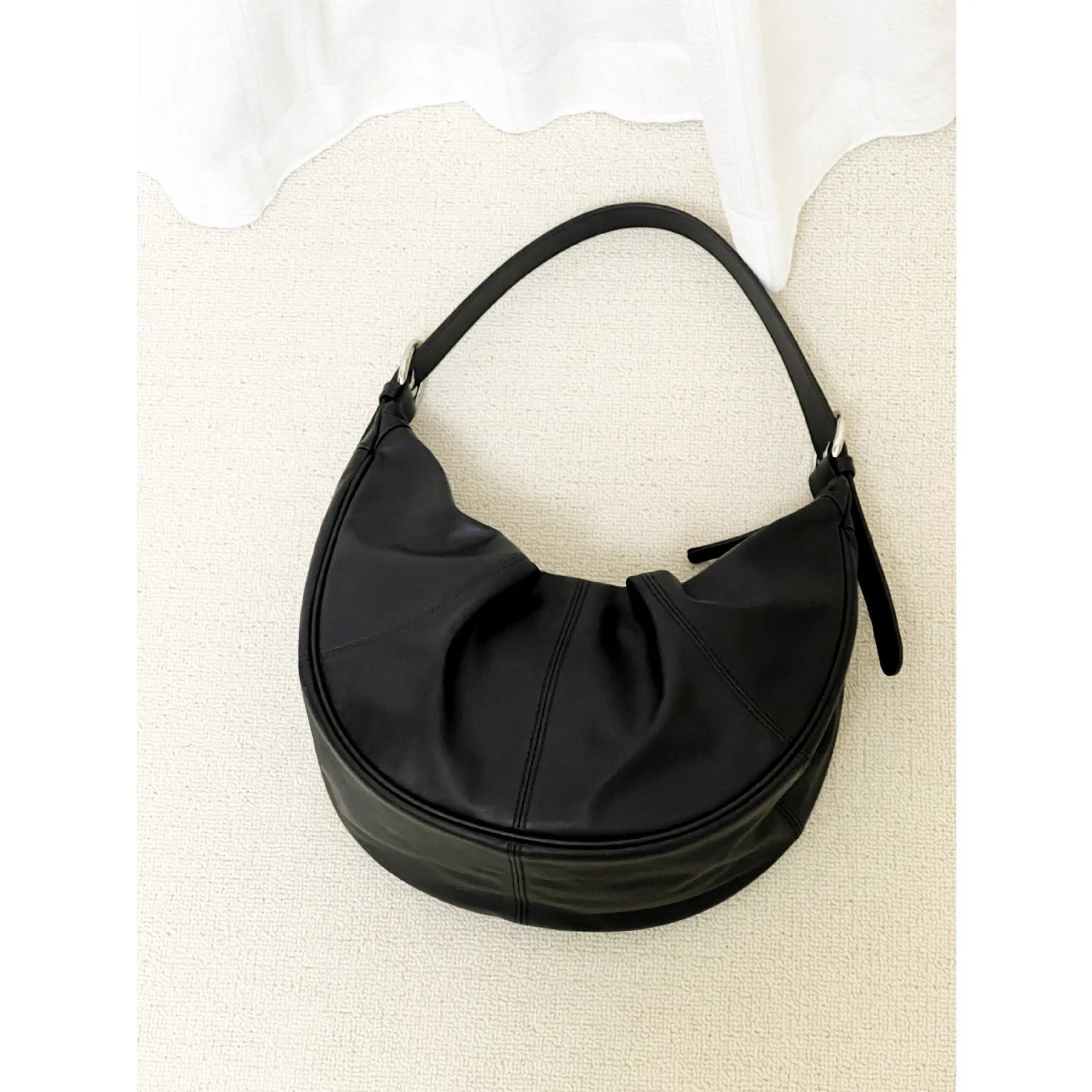 Women's dumpling shaped shoulder bag in soft first layer cowhide leather with double straps