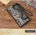 Women's brown genuine leather tri-fold wallet with embossed floral pattern showing interior compartments