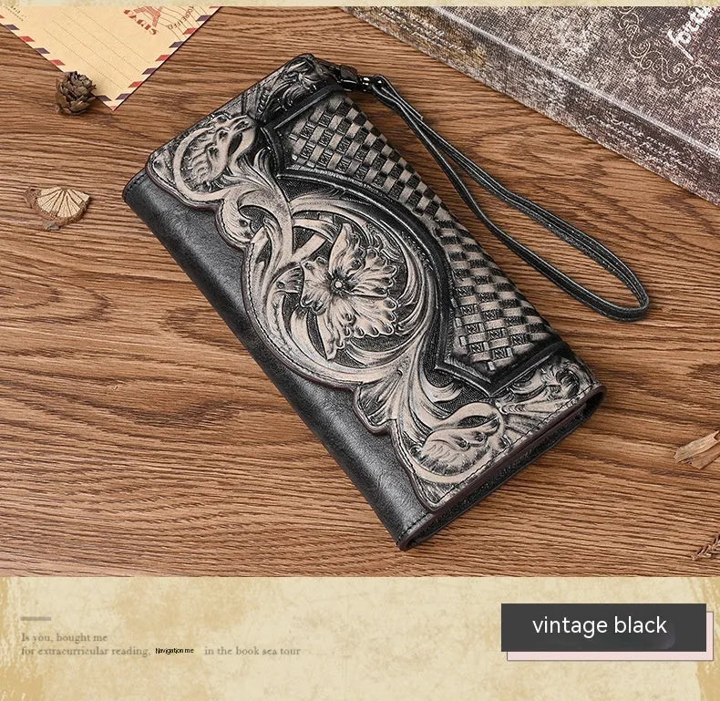 Women's brown genuine leather tri-fold wallet with embossed floral pattern showing interior compartments