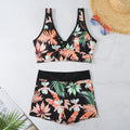 Women's two-piece polyester swimsuit with printed boxer shorts and sleeveless top