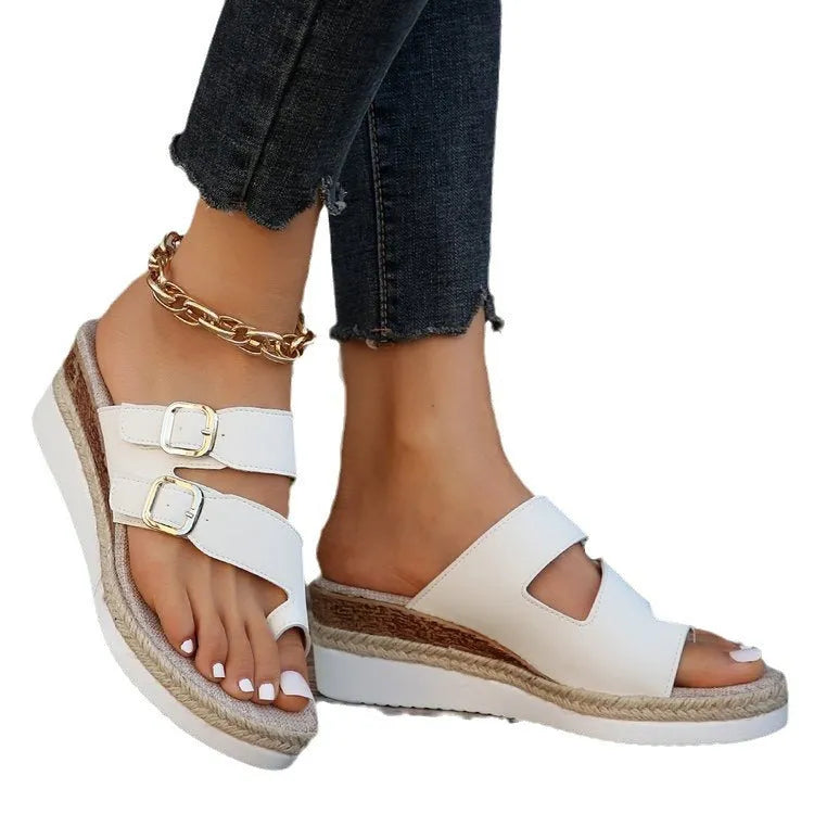 White patent leather wedge sandals with woven upper and finger-fit toe separation design