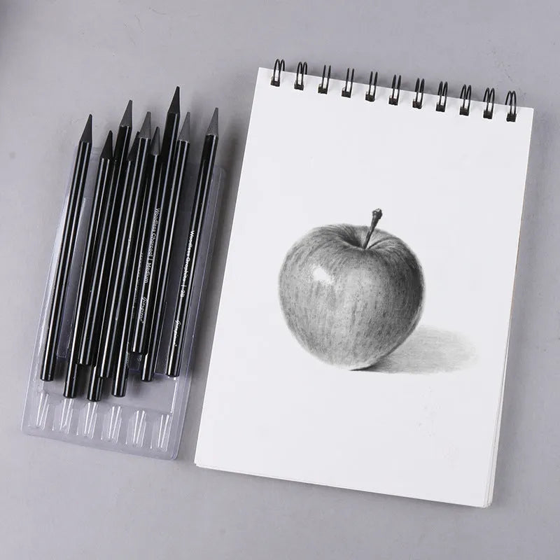 Set of nine wooden drawing pencils on a suction card, containing six graphite and three carbonized pencils for artist sketching.