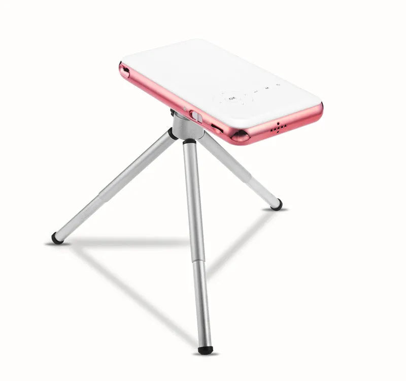 M6S miniature white and rose gold Android DLP projector showing compact 145mm design
