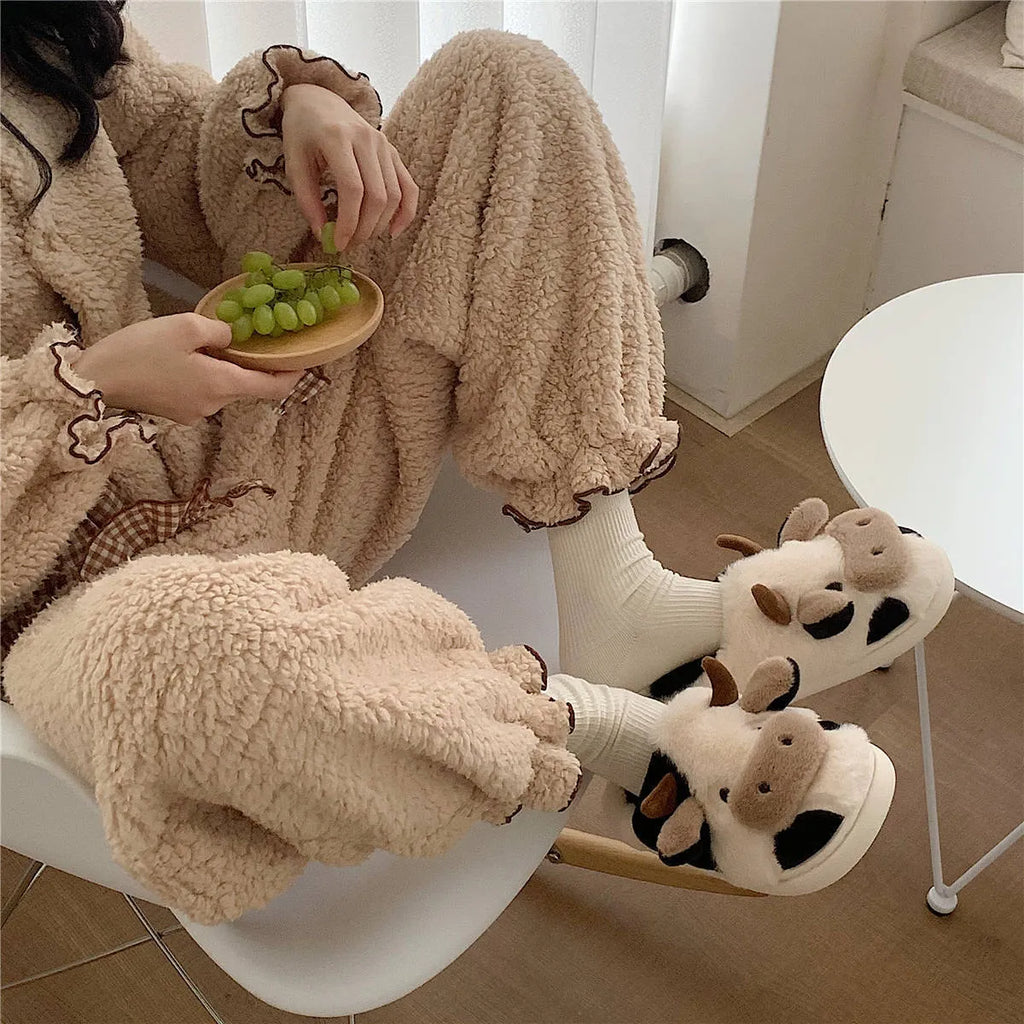White cartoon cow plush slippers for women with non-slip textured PVC soles