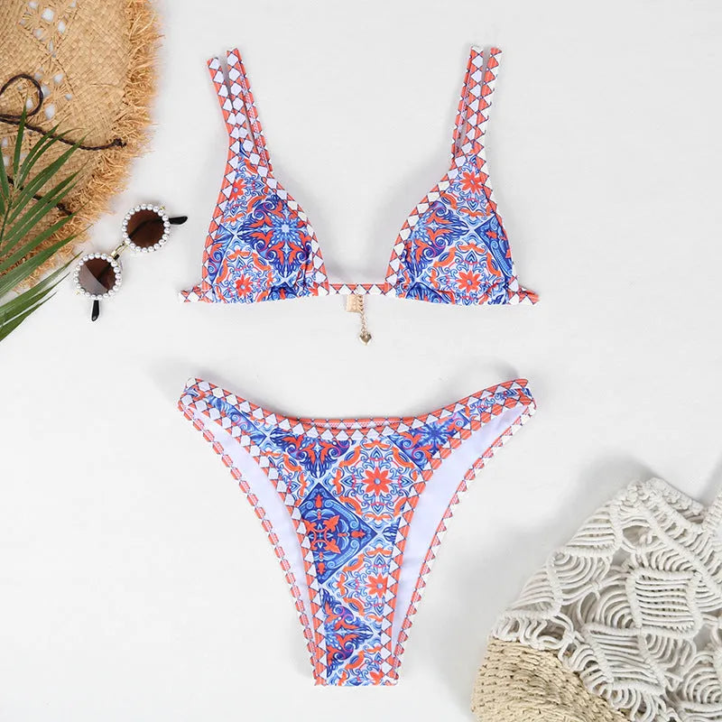 Retro four-colour print women's bikini swimwear in polyester fabric on a mannequin.
