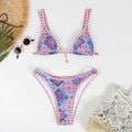 Retro four-colour print women's bikini swimwear in polyester fabric on a mannequin.
