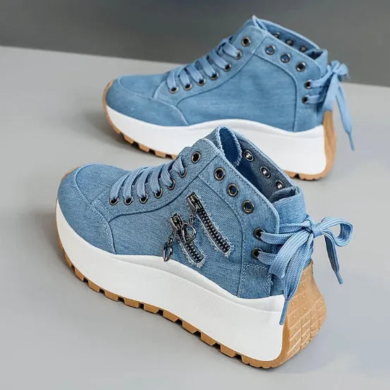 Women's high-top platform shoes in black artificial PU with round toe and lace-up design.
