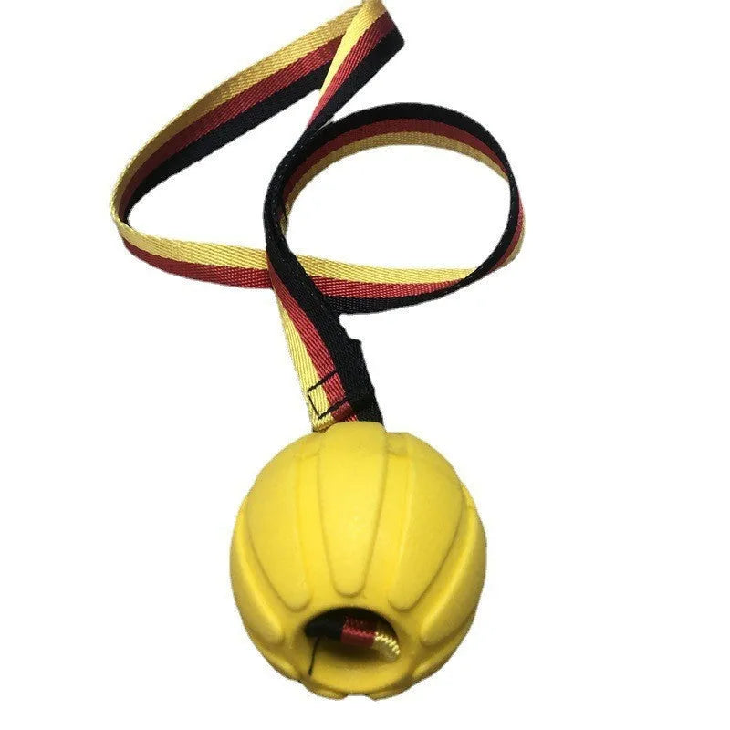 EVA floating dog training ball in camouflage colour and yellow, shown in 65mm, 7cm, and 9cm diameter sizes.