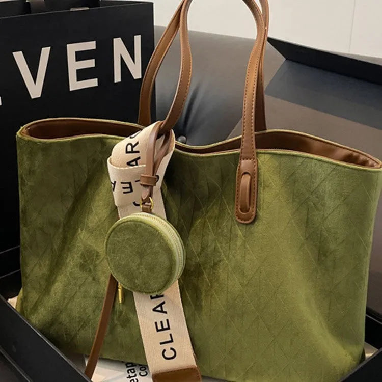 Soft green polyester large shoulder tote bag with horizontal square shape and a shoulder strap.