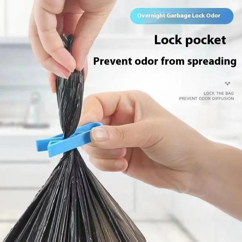 Grey PP plastic garbage bag fixing clip attached to bin side holding liner securely