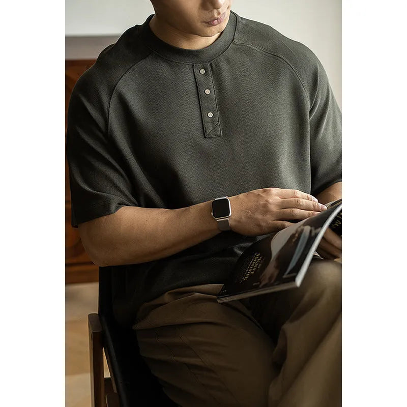 Casual loose pullover top with raglan sleeves in a terry texture fabric, shown in smoky grey.
