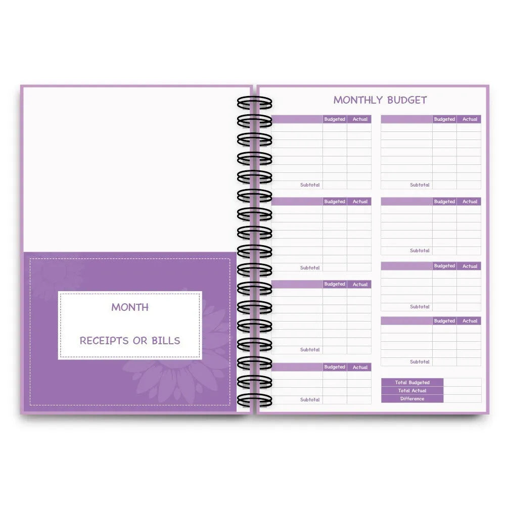 Purple coil-bound financial planning notebook with budgeting stickers and pen on Daolin paper