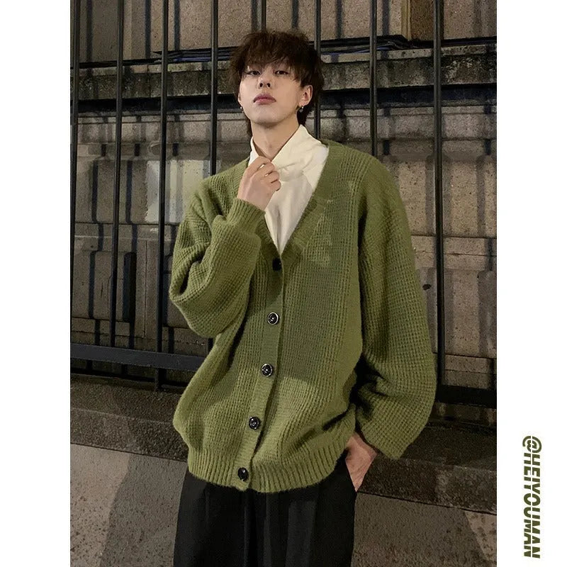 Men's solid colour V-neck cardigan sweater in a loose casual fit.