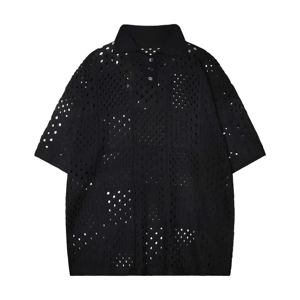 A teenage model wearing a solid black loose-fit knitted polo shirt, short-sleeved cardigan style.
