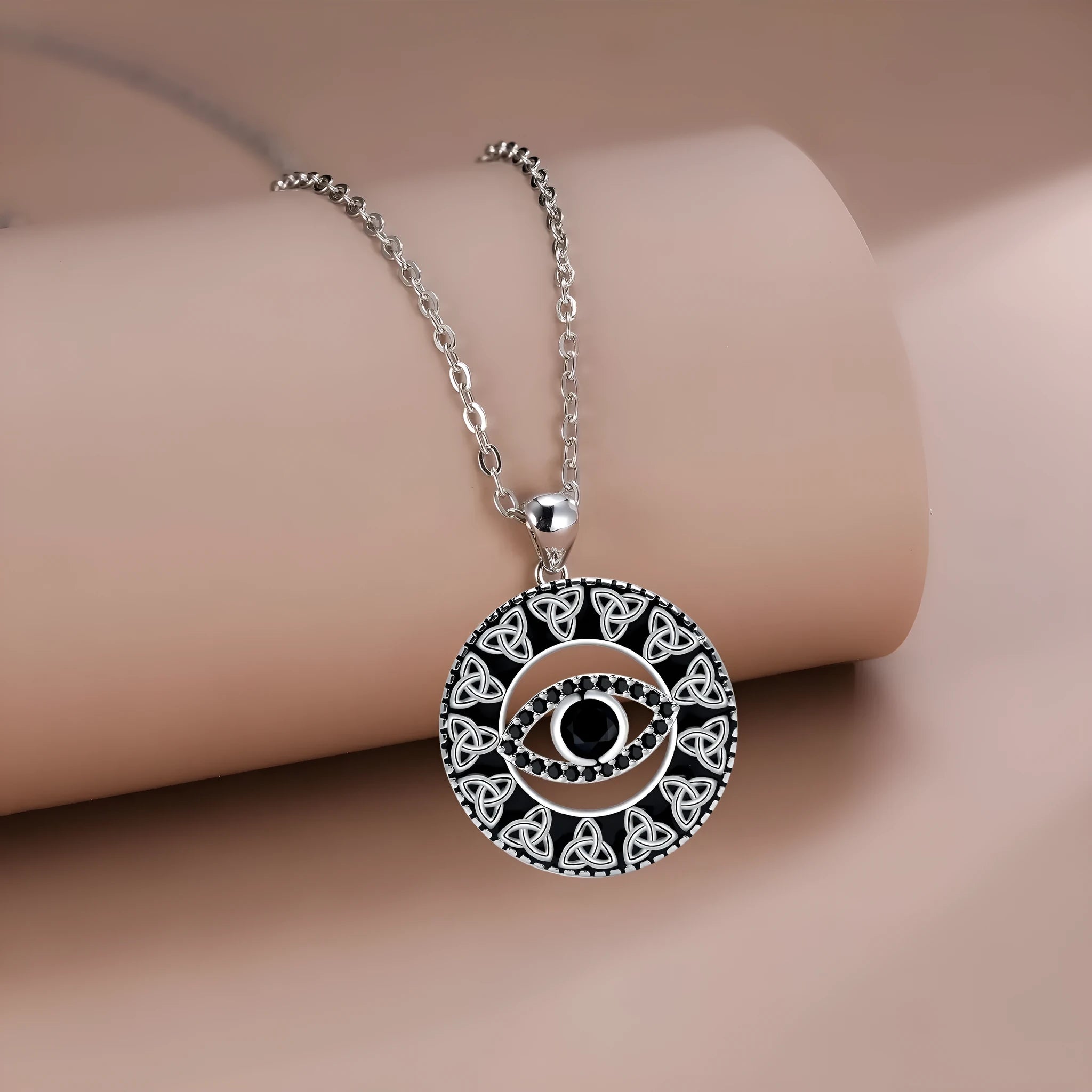 Copper Devil's Eye pendant necklace with electroplated finish and cross chain for women.