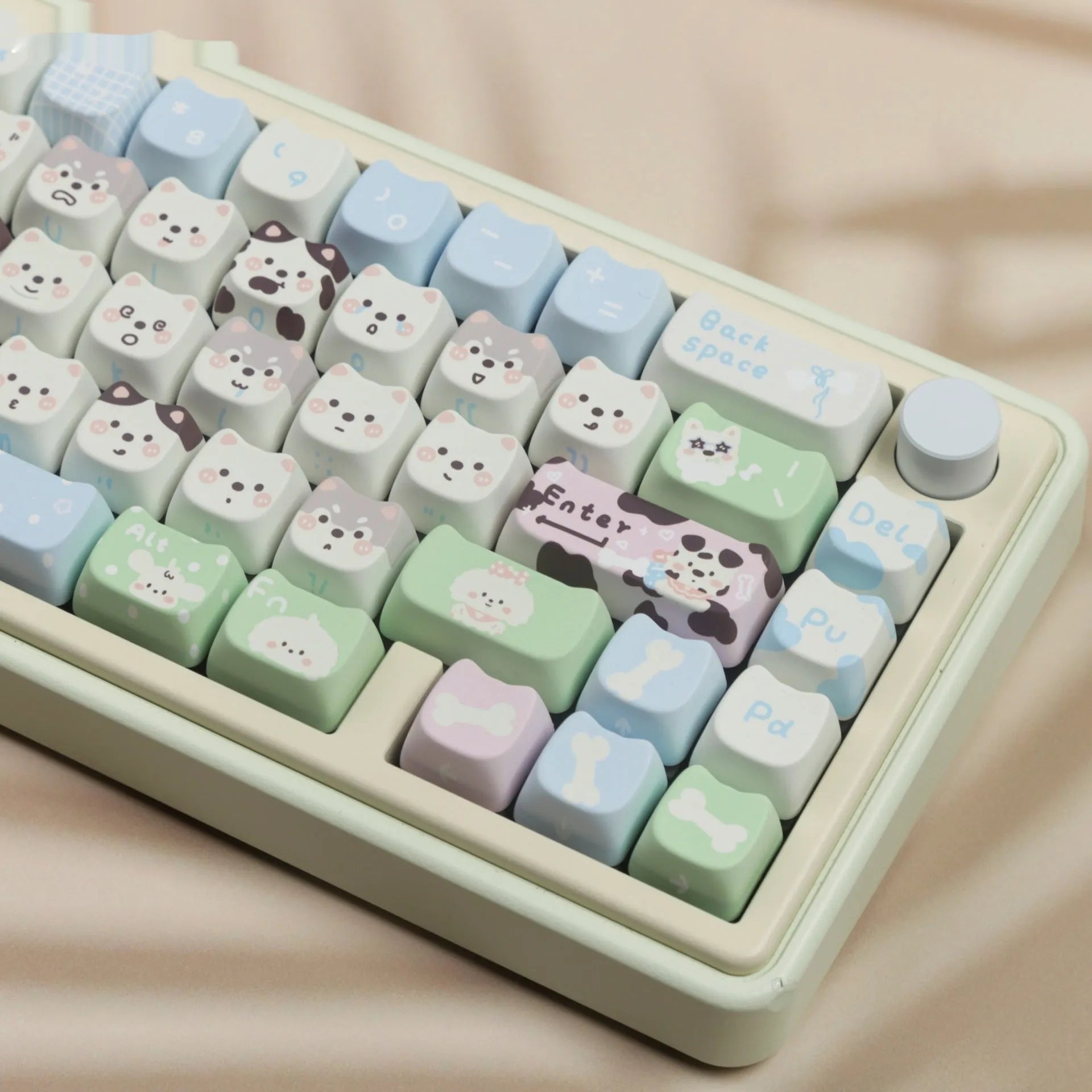 PBT sublimation key cap set showing colourful puppy and cat artwork on mechanical keyboard keys