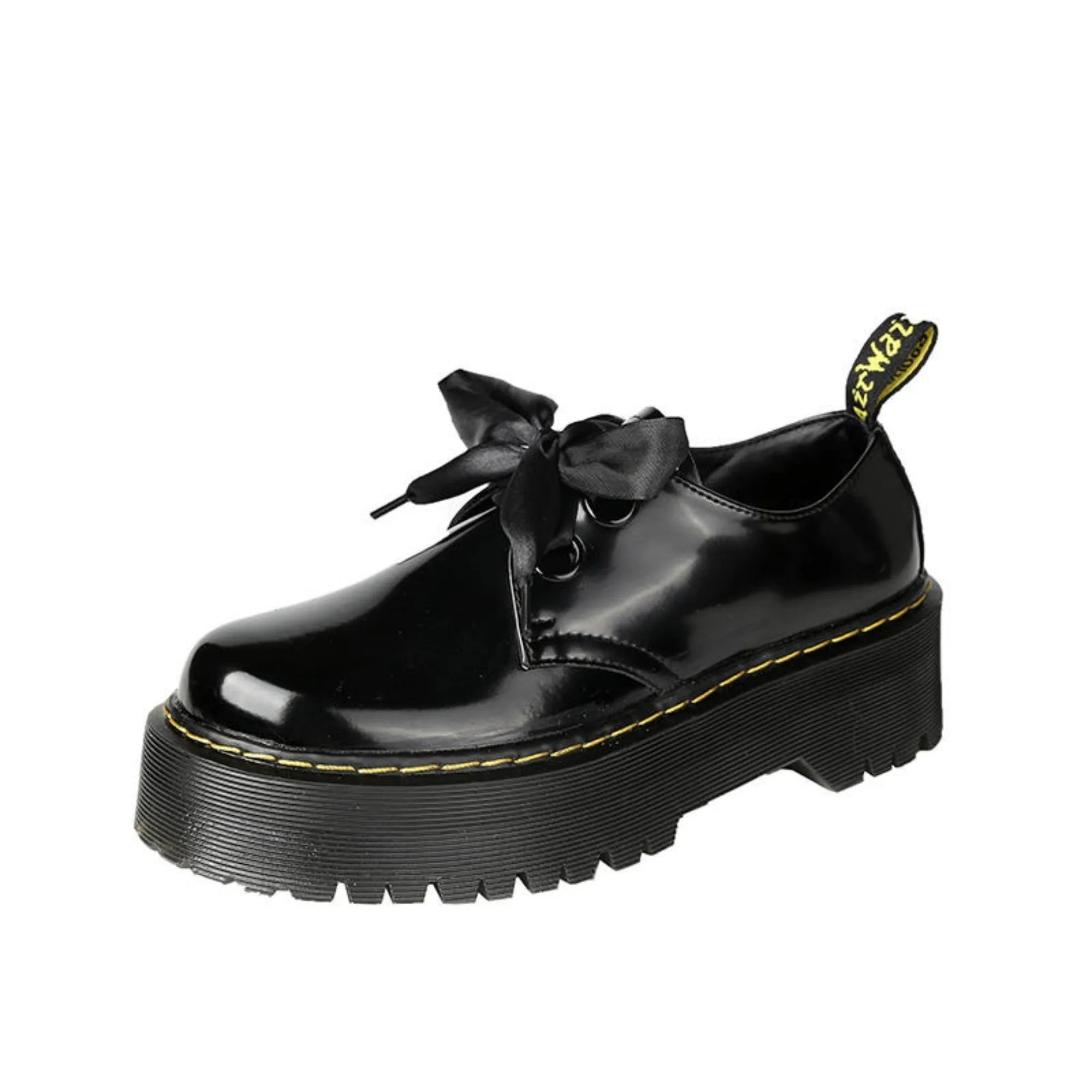 Women's thick soled leather shoes with ribbon cross straps and lace-up closure in black colour