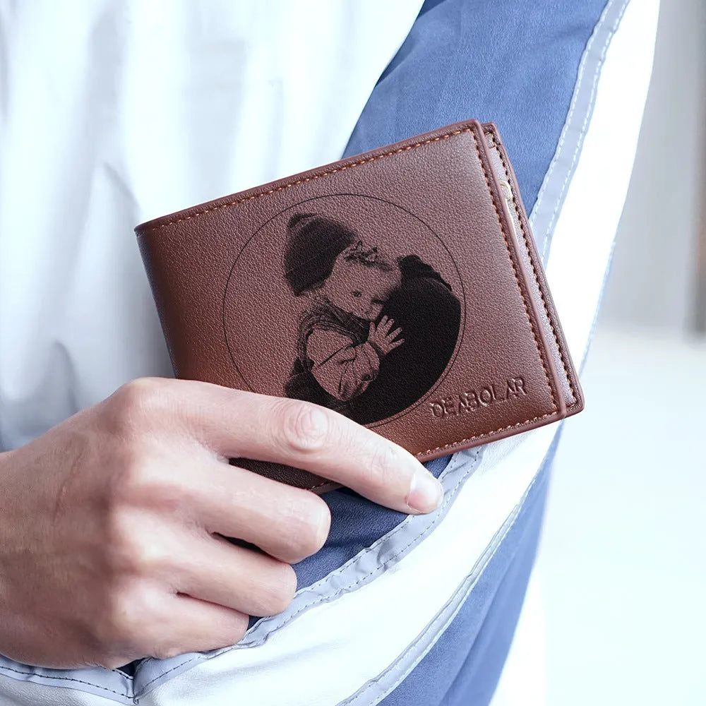 Men's leather wallet with a zipper closure, presented as a gift.