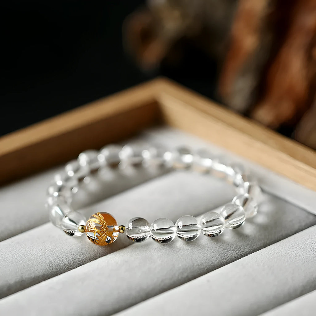Geometric unisex bracelet with obsidian, black agate, and white crystal beads and dragon charm