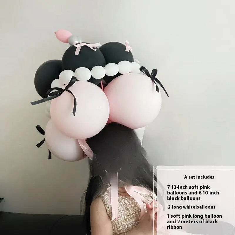 Round shaped balloon bouquet cake decoration DIY kit with colourful balloons arranged as party centrepiece