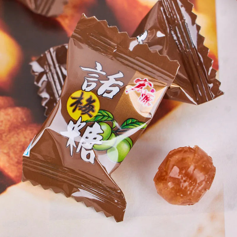 Bag containing three packs of hard candy: tangerine peel, plum sugar, and guava flavours.