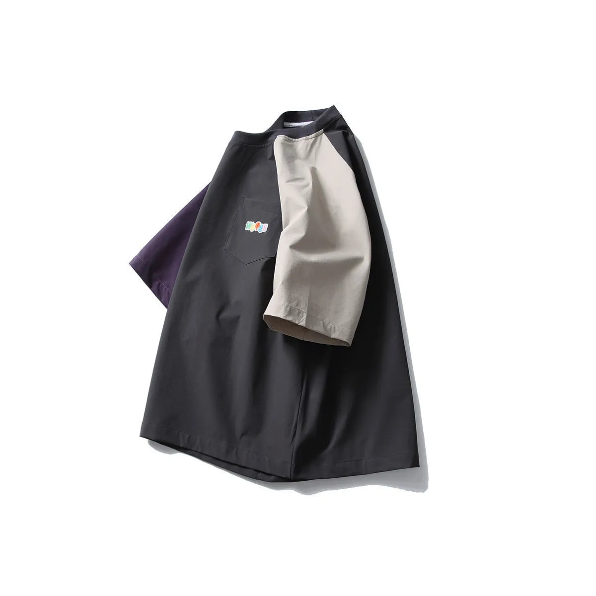 Dark grey men's loose fit t-shirt with contrast raglan sleeves on a neutral background