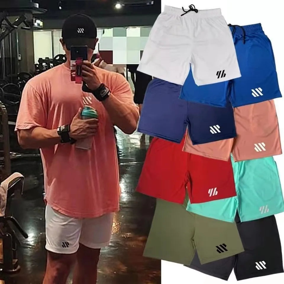 Men's loose black metal silk fabric sports shorts for running, laid flat.