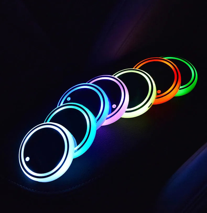 Colourful LED light-up coaster for car cup holder with USB cable.