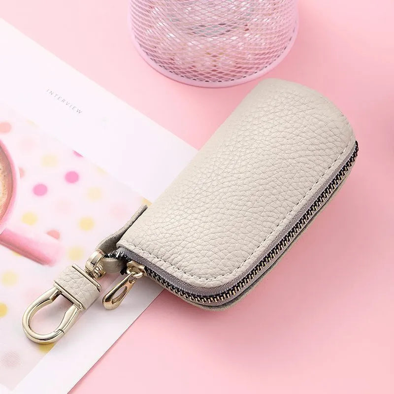 Men's black PU leather key case with silver zipper closure for car and house keys