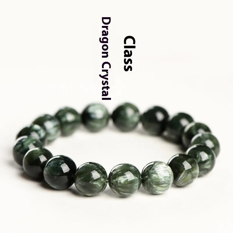 Green Dragon Crystal bracelet with round 8-9mm beads on a wrist.