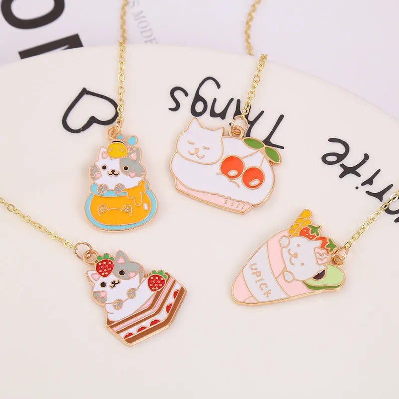 Jane Key Foodie Cute Pet Cat metal bookmark with cartoon pendant, shown in various colour designs.