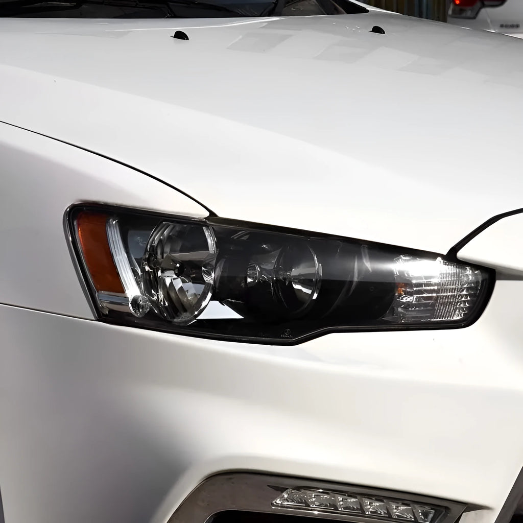 Transparent plastic headlight housing covers for main driver and co-pilot vehicle lamps