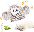 Grey rechargeable electronic owl cat toy with flapping wings on a floor.