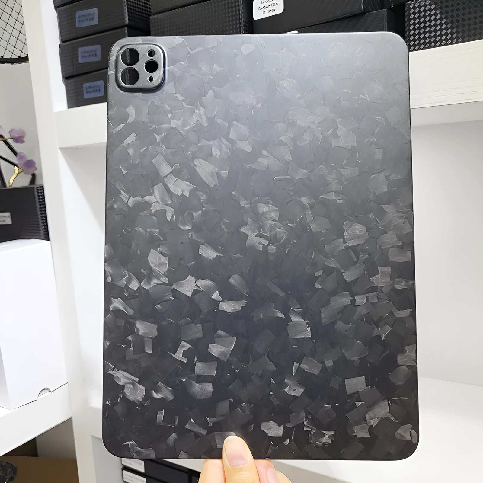 Genuine carbon fibre flat protective cover for Apple iPad Pro 11 with embossed plaid pattern.