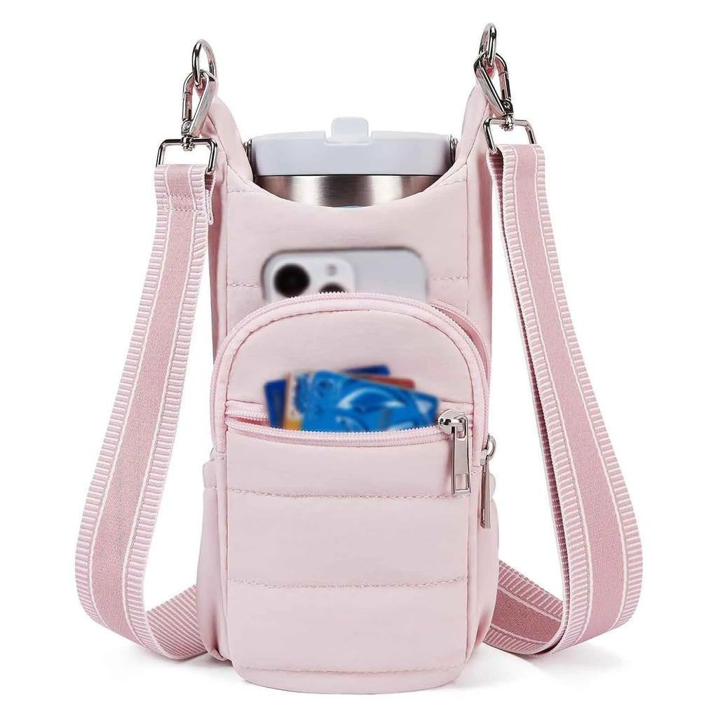 Kettle-shaped cycling water bottle bag in black colour mounted on bicycle handlebars
